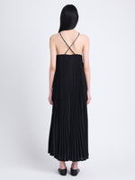Back full length image of model wearing Celeste Dress In Lightweight Crepe in BLACK