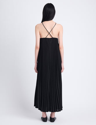 Back full length image of model wearing Celeste Dress In Lightweight Crepe in BLACK