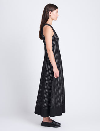 Side full length image of model wearing Juno Dress In Broderie Anglaise in BLACK/OFF WHITE