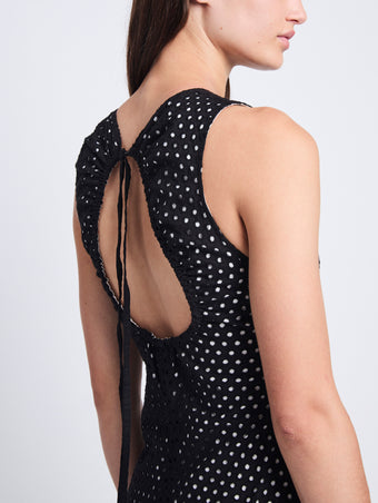 Detail image of model wearing Juno Dress In Broderie Anglaise in BLACK/OFF WHITE