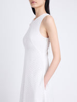 Detail image of model wearing Juno Dress In Broderie Anglaise in OFF WHITE