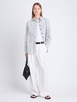 Front full length image of model wearing Eliana Shirt In Striped Shirting Flou in IVORY/NAVY MULTI