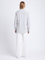 Back full length image of model wearing Eliana Shirt In Striped Shirting Flou in IVORY/NAVY MULTI
