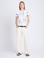 Front image of model wearing Finley Tie Dye T-Shirt in white/navy/olive