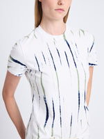 Detail image of model wearing Finley Tie Dye T-Shirt in white/navy/olive