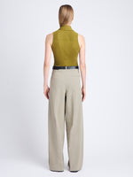 Back full length image of model wearing Florence Top In Matte Crepe Jersey in OLIVE