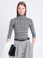 Front cropped image of model wearing Amiri Top In Painted Grid Jersey in BLACK/OFF WHITE