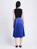 Back full length image of model wearing Daphne Skirt in Faux Leather in SAPPHIRE