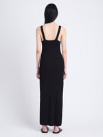 Back full length image of model wearing Hayden Dress In Midweight Button Details Knits in BLACK