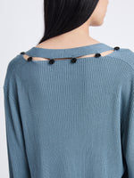 Detail image of model wearing Elsie Top In Midweight Button Details Knits in JUNIPER