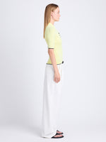 Side full length image of model wearing Spencer Blouse In Boucle Viscose in CITRINE