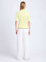 Back full length image of model wearing Spencer Blouse In Boucle Viscose in CITRINE