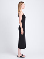 Side full length image of model wearing Sydney Dress In Boucle Viscose in BLACK