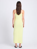 Back full length image of model wearing Sydney Dress In Boucle Viscose in CITRINE