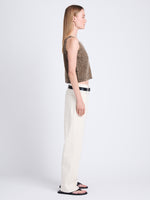 Side full length image of model wearing Drew Top In Chunky Marl in CAMEL/BLACK