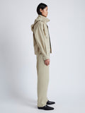 Side image of model wearing Windsor Jacket in Rumpled Cotton in khaki