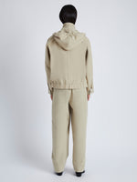 Back image of model wearing Windsor Jacket in Rumpled Cotton in khaki