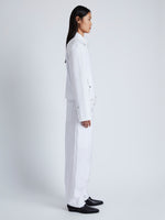 Side image of model wearing Barnes Jacket in Rumpled Cotton in WHITE