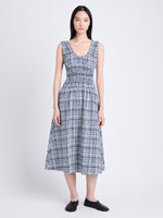 Front full length image of model wearing Penny Dress in Grid Poplin in NAVY/OFF WHITE