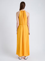 Back full length image of model wearing Lenny Dress in Matte Jersey in MARIGOLD