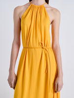 Detail image of model wearing Lenny Dress in Matte Jersey in MARIGOLD
