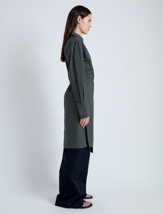 Side full length image of model wearing Lane Wrap Dress in Yarn Dye Shirting in BLACK/PALE YELLOW