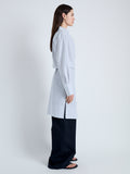 Side full length image of model wearing Lane Wrap Dress in Yarn Dye Shirting in WHITE/PEWTER