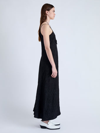 Side full length image of model wearing Davis Dress in Crinkled Flou in BLACK