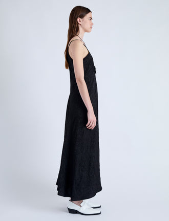 Side full length image of model wearing Davis Dress in Crinkled Flou in BLACK
