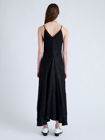 Back full length image of model wearing Davis Dress in Crinkled Flou in BLACK