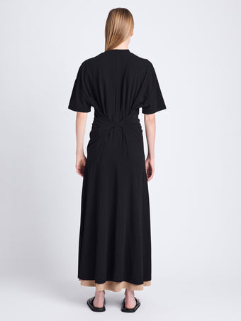 Back image of model wearing Noelle Dress in Jersey in BLACK