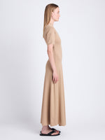 Side image of model wearing Noelle Dress in Jersey in KHAKI