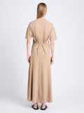 Back image of model wearing Noelle Dress in Jersey in KHAKI