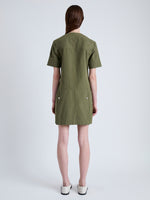 Back full length image of model wearing Watson Dress in Rumpled Cotton in DARK OLIVE