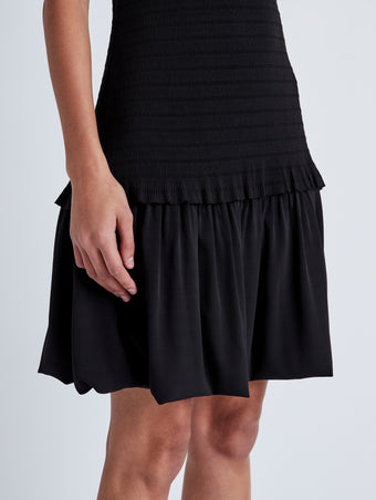 Detail image of model wearing Martine Dress in Micro Pleat in BLACK