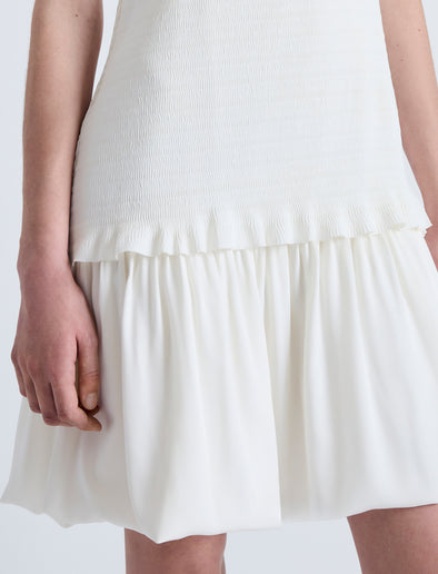 Detail image of model wearing Martine Dress in Micro Pleat in OFF WHITE