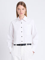 Front cropped image of model wearing Alma Shirt in Peached Poplin in WHITE