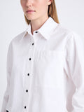 Detail image of model wearing Alma Shirt in Peached Poplin in WHITE