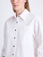 Detail image of model wearing Alma Shirt in Peached Poplin in WHITE