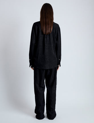 Back full length image of model wearing Hall Shirt in Crinkled Flou in BLACK