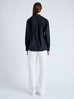 Back full length image of model wearing Carter Top in Tech Poplin in BLACK
