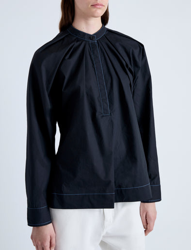 Detail image of model wearing Carter Top in Tech Poplin in BLACK