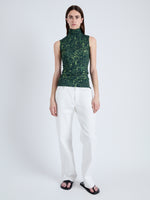 Front full length image of model wearing Ines Top in Shadow Print Jersey in DARK NAVY/OLIVE