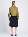 Back full length image of model wearing Olive Skirt in Peached Poplin in BLACK