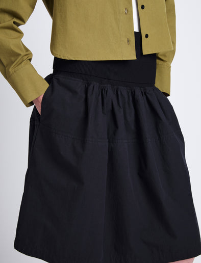 Detail image of model wearing Olive Skirt in Peached Poplin in BLACK
