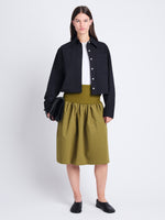 Front image of model wearing Olive Skirt in Peached Poplin in OLIVE