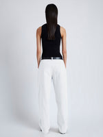 Back image of model wearing Sydnor Pants in Rumpled Cotton in white