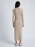Back image of model wearing Phillips Knit Dress in Micro Cable in CASHEW