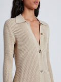 Detail image of model wearing Phillips Knit Dress in Micro Cable in CASHEW