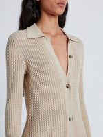 Detail image of model wearing Phillips Knit Dress in Micro Cable in CASHEW